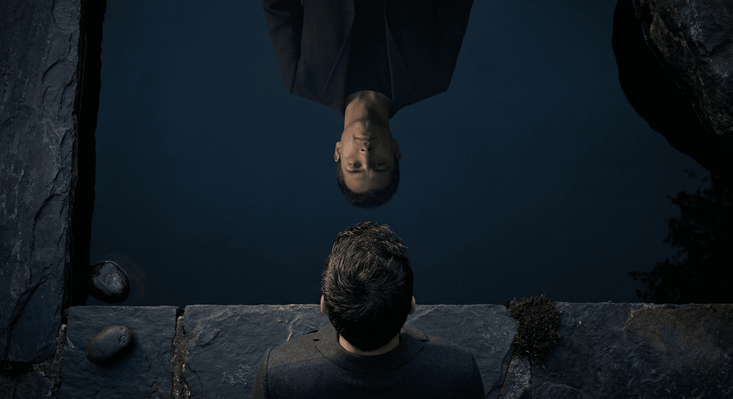 Leader's reflection in still water representing personal core values self-examination and how founder values shape company culture